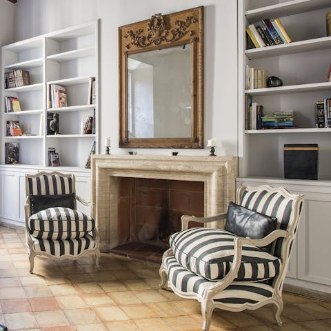 Get toasty around the open fire if the Roman weather turns cold