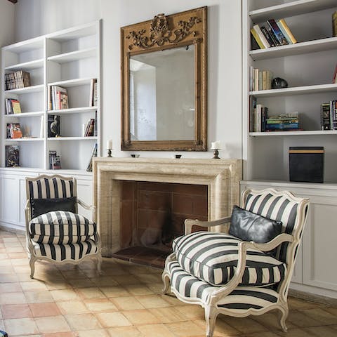 Get toasty around the open fire if the Roman weather turns cold