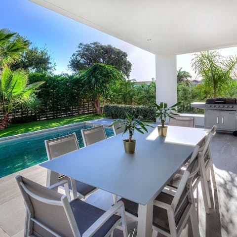 Gather around the outdoor dining table