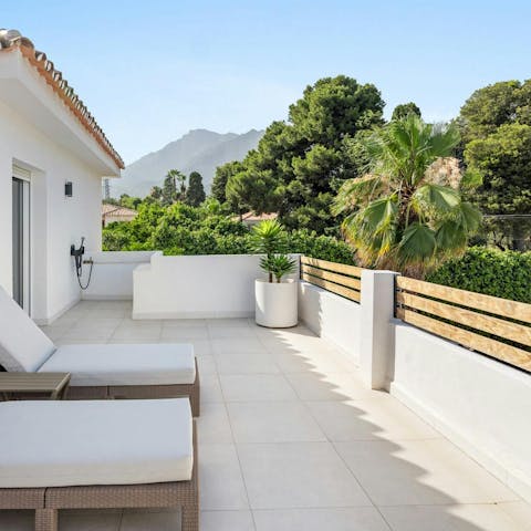 Find peace and relaxation while lounging on the terrace