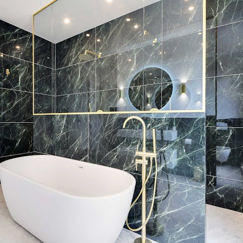 Unwind in a bubble bath after visiting the Mona Lisa at the Louvre