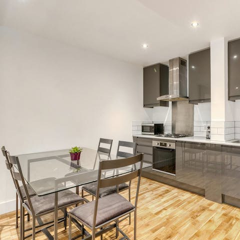 Enjoy home-cooked meals in the practical kitchen and dining area