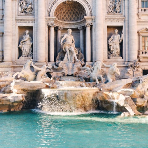 Make the twenty minute stroll to reach the Trevi Fountain