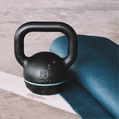Workout in the private outdoor gym before taking a plunge in the pool