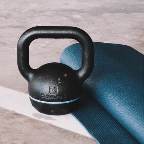 Workout in the private outdoor gym before taking a plunge in the pool