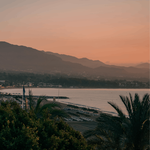 Take a sunset stroll along Playa de Venus, only minutes away