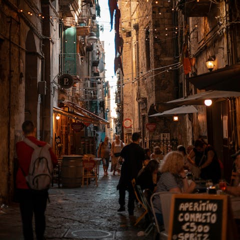 Explore the bustling Quartieri Spagnoli, a thirteen-minute walk away