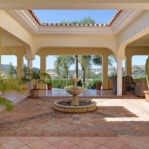 Enjoy the palatial design of the villa, with its Roman-inspired architecture