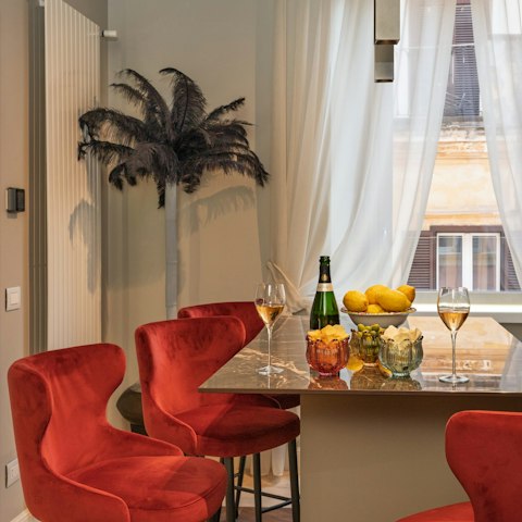 Enjoy a glass of wine at the kitchen bench