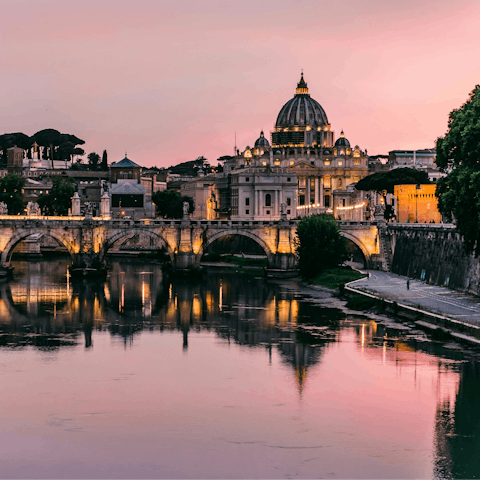 Take a twilit stroll along the banks of the Tiber, also a five-minute walk away