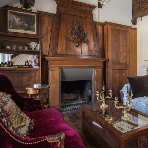 Spend chilly evenings lounging in front of the fireplace