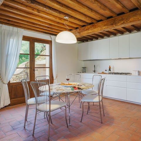 Dine on Tuscan dishes under the traditional timber ceilings