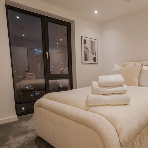 Admire skyline views from the bedroom