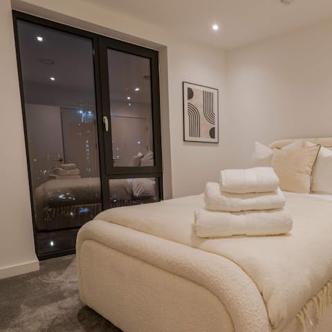 Admire skyline views from the bedroom