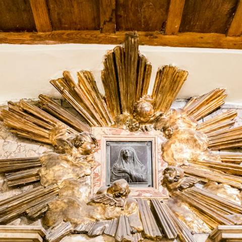 Admire the stunning original features of this historic apartment