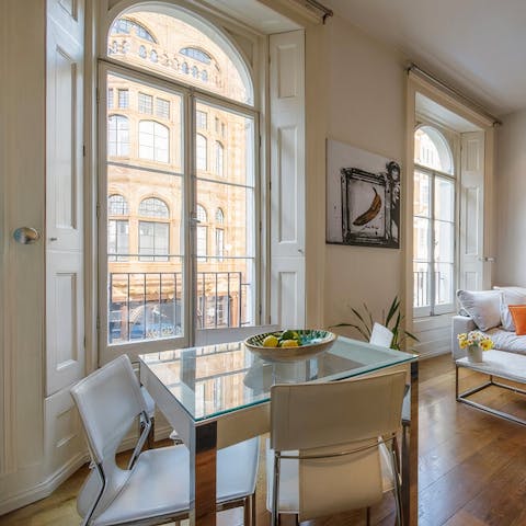 Enjoy a cooked breakfast beside floor-to-ceiling windows