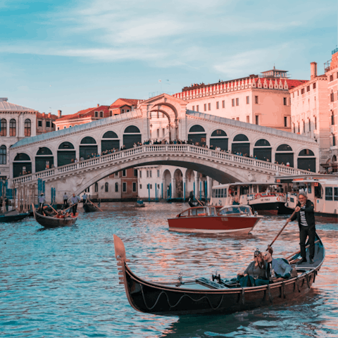 Take some photos of the iconic Rialto Bridge, a three-minute walk away