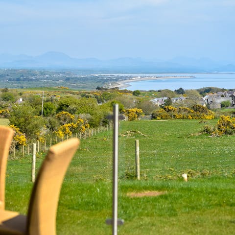 Step out onto the patio and admire the far-reaching view of Cardigan Bay