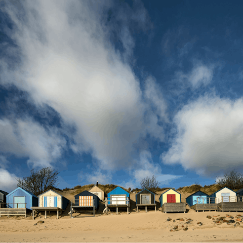 Drive less than ten minutes to reach the beach hut-lined sands of Abersoch beach
