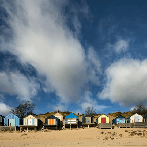 Drive less than ten minutes to reach the beach hut-lined sands of Abersoch beach