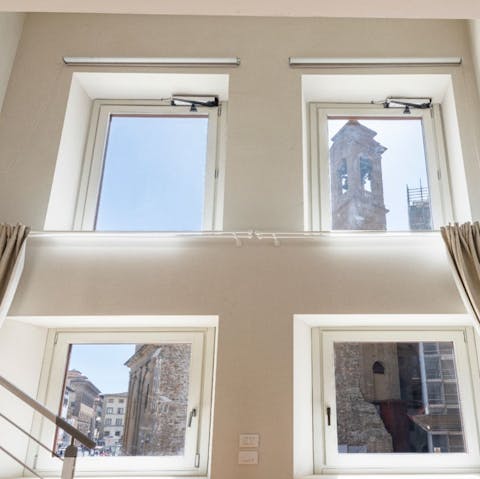 Peer out at Basilica di San Lorenzo through the magnificent picture windows