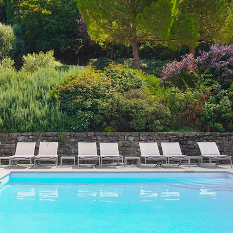 Relax beside the private pool