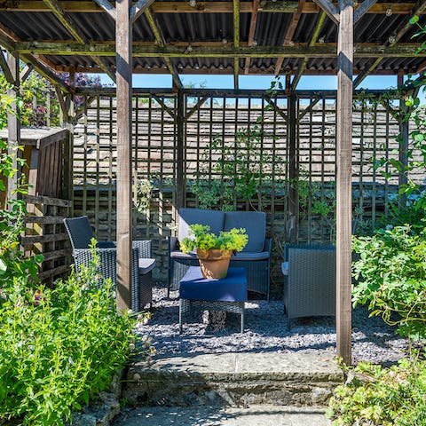 Admire the nature all around you as you take your morning tea outside under the awning