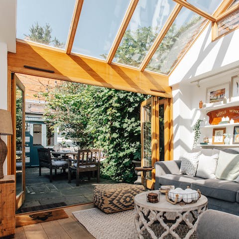 Watch the clouds glide on by through the huge skylight