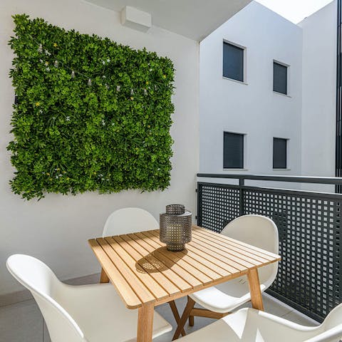 Light the lantern candle and sip sundowners on your private terrace