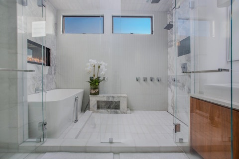Soak in a light-flooded bathroom designed for serious relaxation