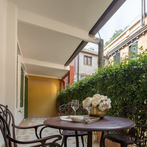 Toast a productive day's sightseeing with a digestif on the terrace