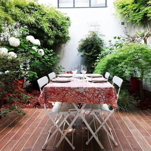 Sip on a glass of wine and catch up in the privacy of the garden