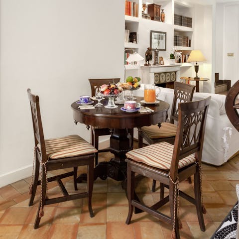 Tuck into tasty pasta dishes around your solid wooden dining set