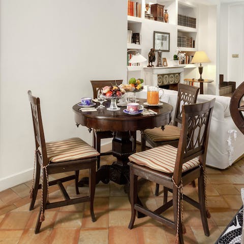 Tuck into tasty pasta dishes around your solid wooden dining set