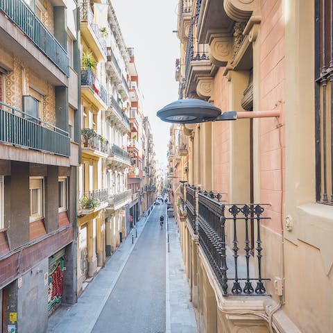 Perch by the living room's Juliet balconies while people-watching over a glass of Spanish wine