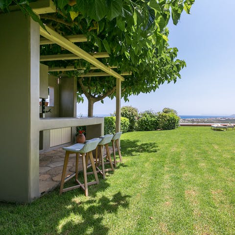 Gather at the leafy outdoor kitchen and prepare some afternoon snacks