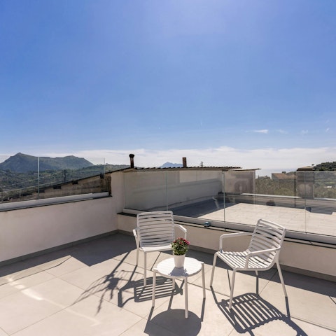 Soak up incredible mountain and sea views from the private terrace