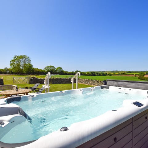 Sit back and enjoy the good life from your own private swim spa