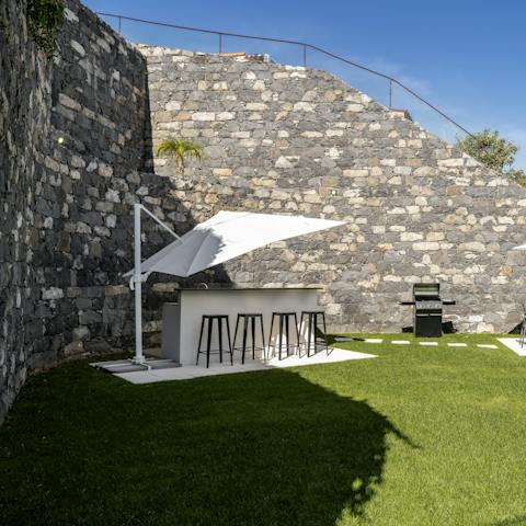 Pour yourself a cocktail at the garden bar