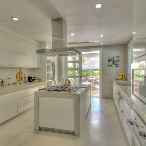 Put the contemporary kitchen through its paces or leave it to the home's private chef