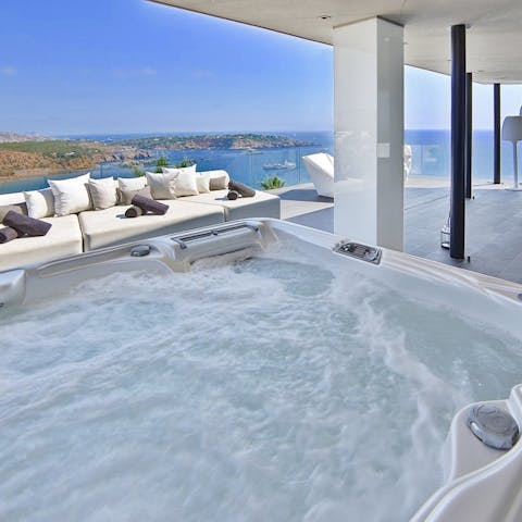 Admire views from the balcony jacuzzi