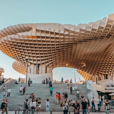 Visit the spectacular Setas de Sevilla, a twenty-two-minute walk away
