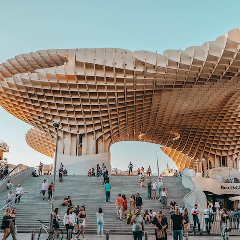 Visit the spectacular Setas de Sevilla, a twenty-two-minute walk away