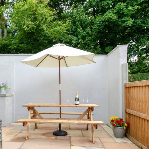 Relax on the patio and enjoy watching the evening roll in with a sundowner in hand