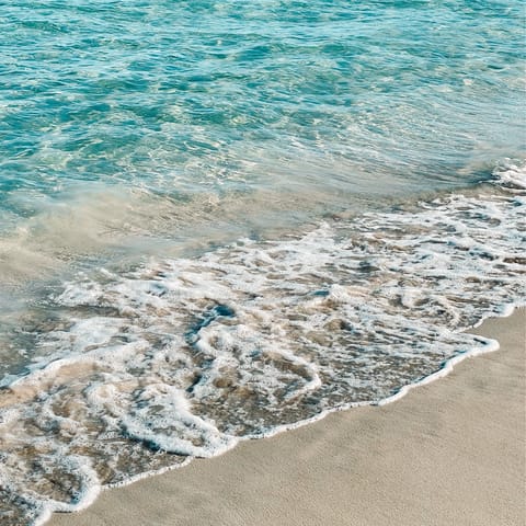 Throw on your sunhat and take the short four-minute drive to Talamanca Beach