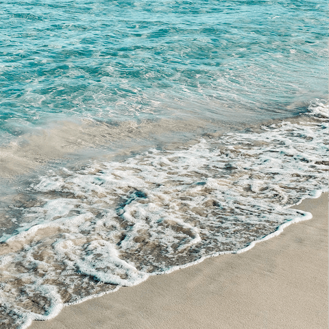 Throw on your sunhat and take the short four-minute drive to Talamanca Beach