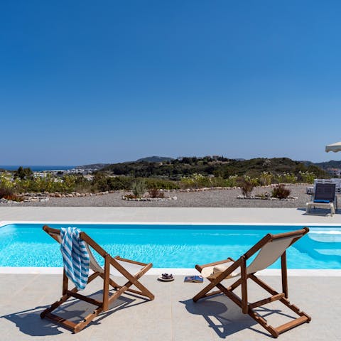 Relax in a deck chair with an ice-cold drink before plunging into your private pool
