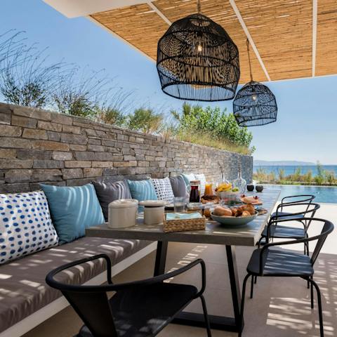 Enjoy breakfast under the shade of the pergola