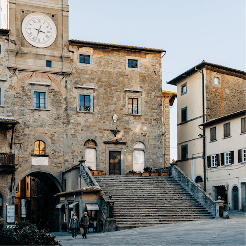 Admire the medieval streets of Cortona – just a short drive away