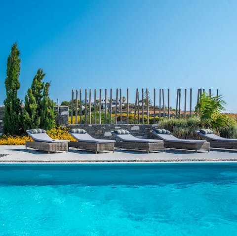 Step outside and spend relaxing days by the pool or walk down to the beach – only five–minutes away